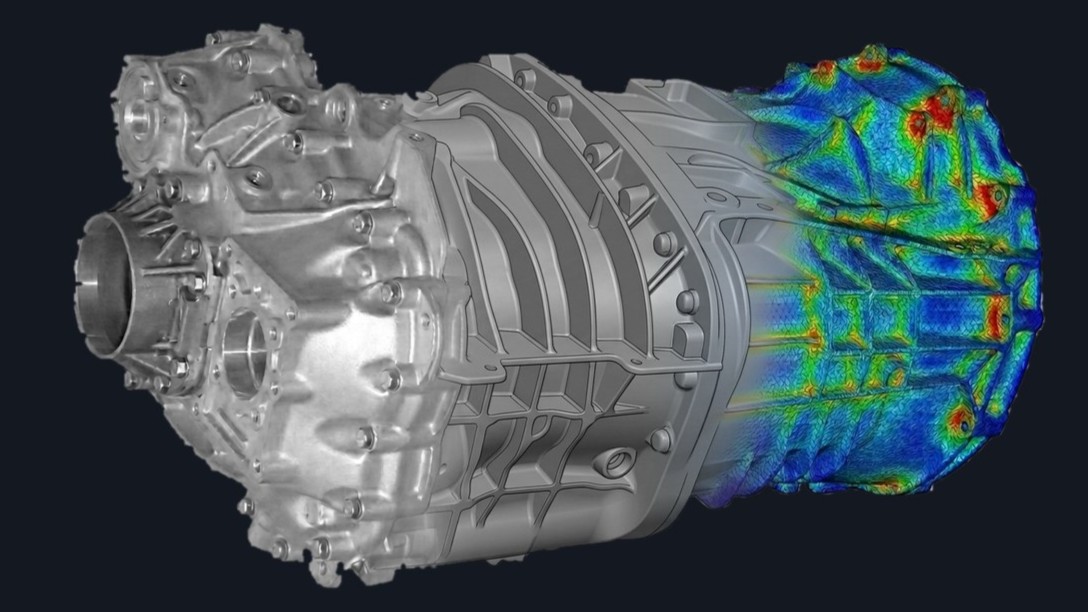 Gearbox casing shown as photograph, CAD model and FEA stress contour